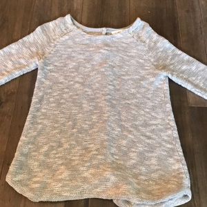Knit grey and white sweater cozy with buttons